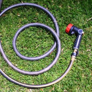 a hose coiled up on a lawn